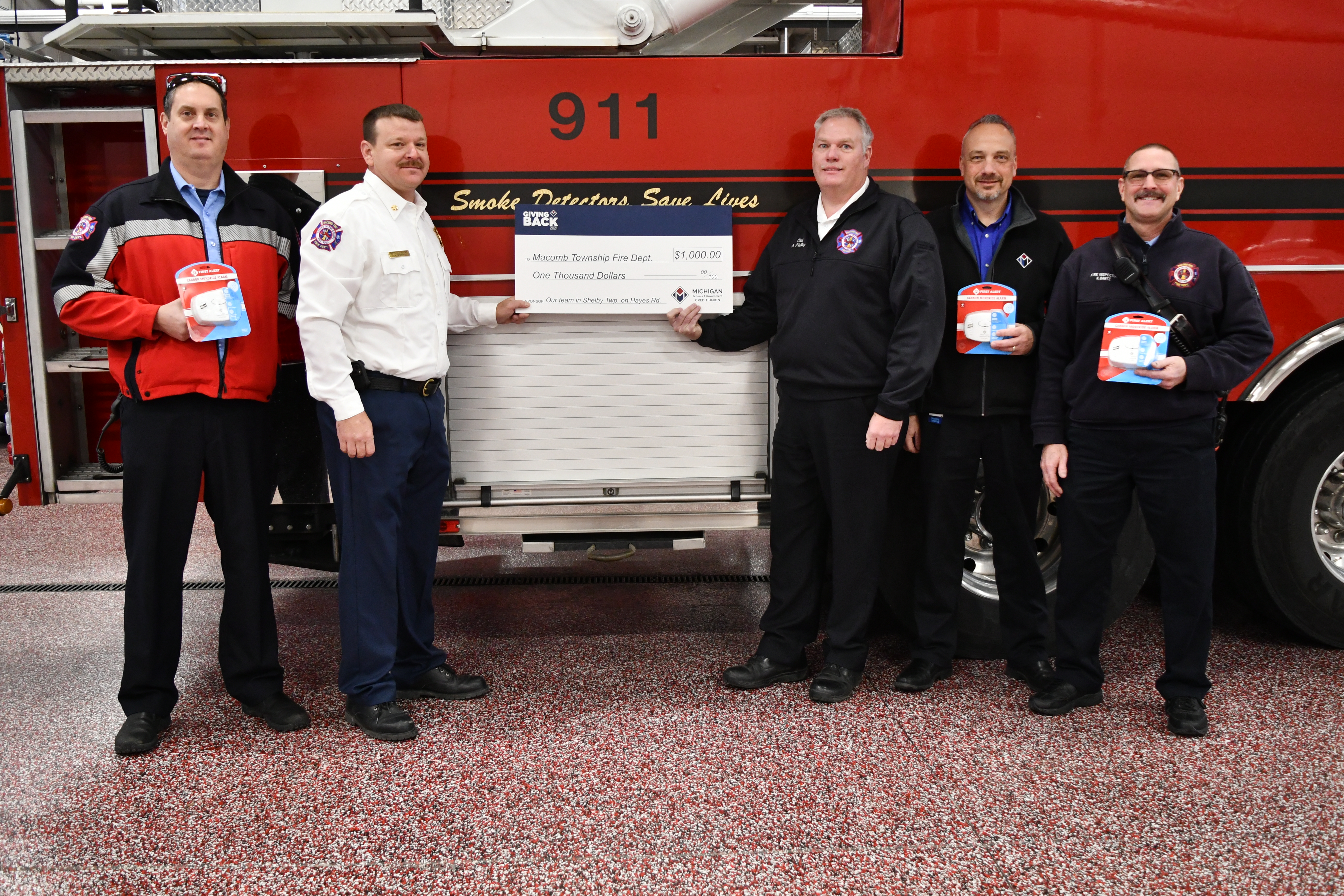 CARE House of Oakland County check presentation